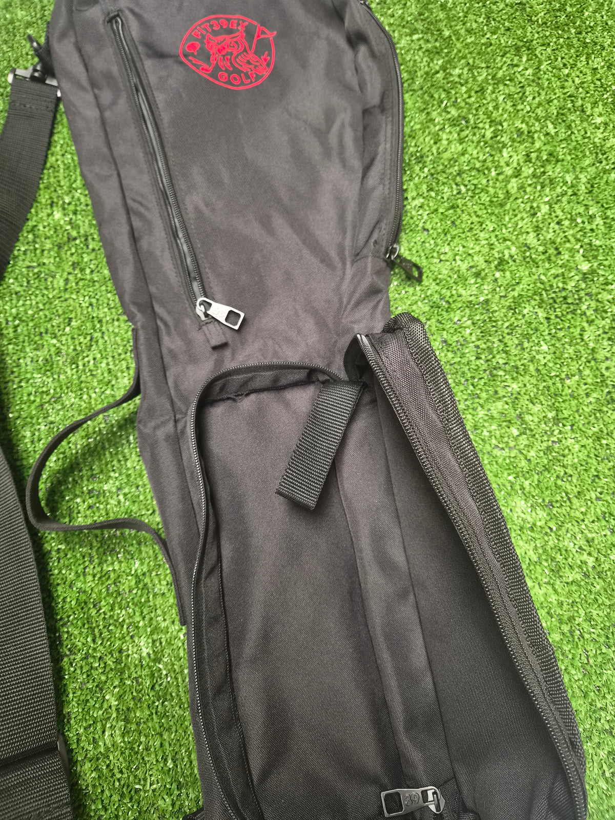 Folded Navy Sunday golf bag in packaging